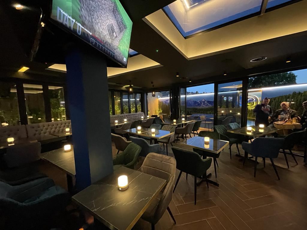Completed lounge bar with skylight and banquette seating, G Lounge