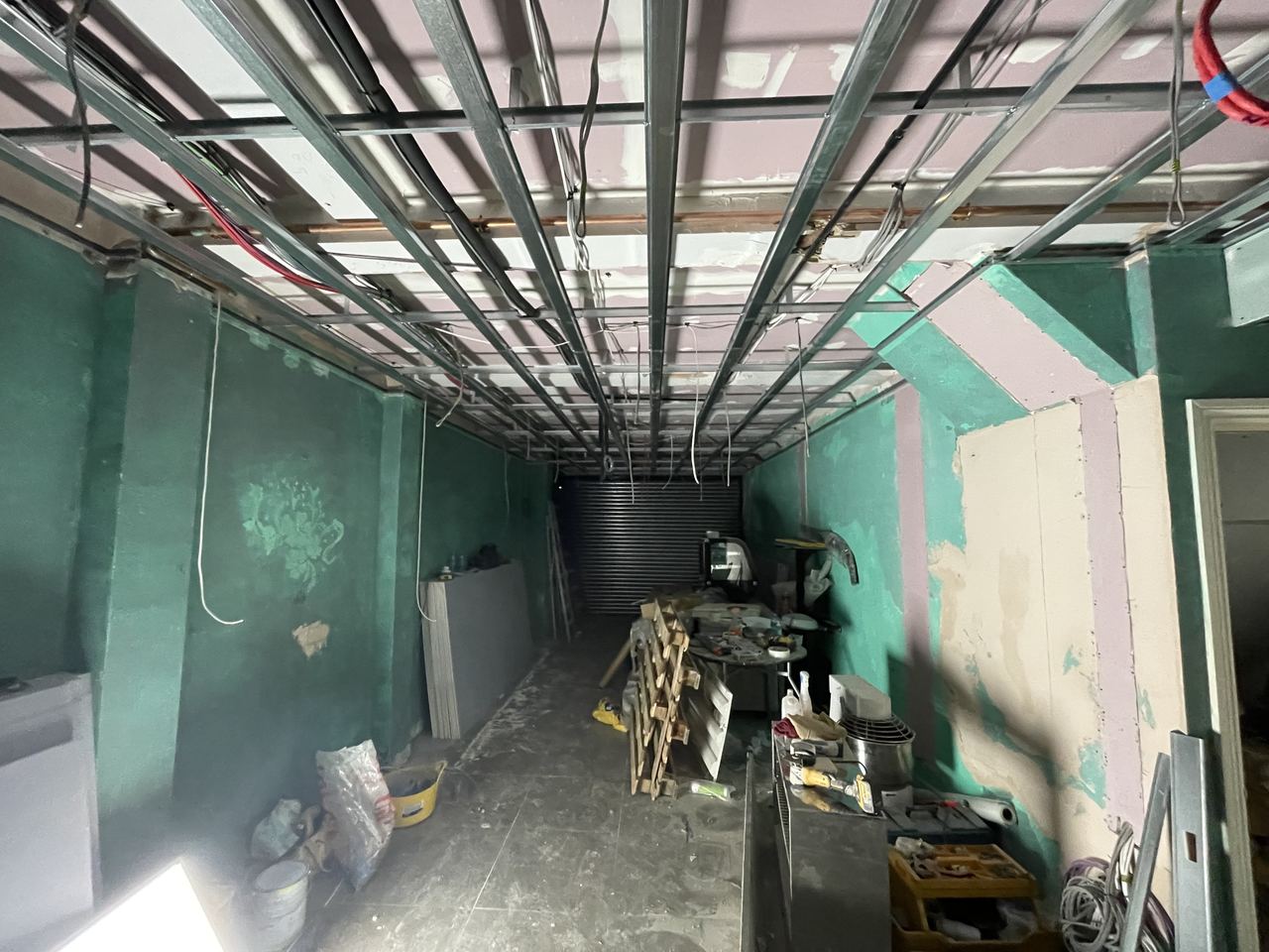 G Lounge: the unit stripped to bare walls