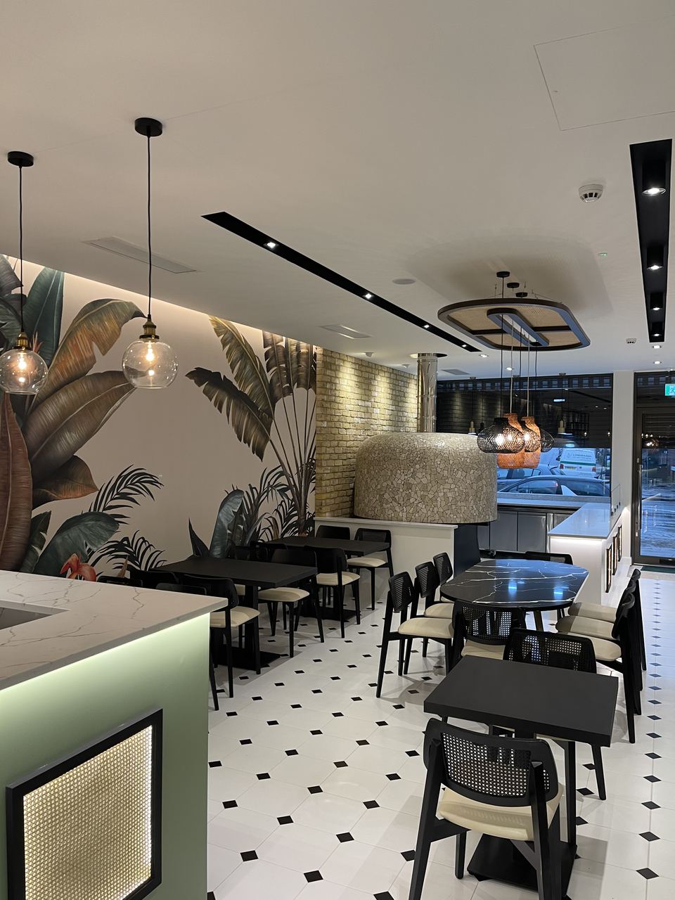 Gusto D'Italia: seating area beneath the illuminated feature ceiling