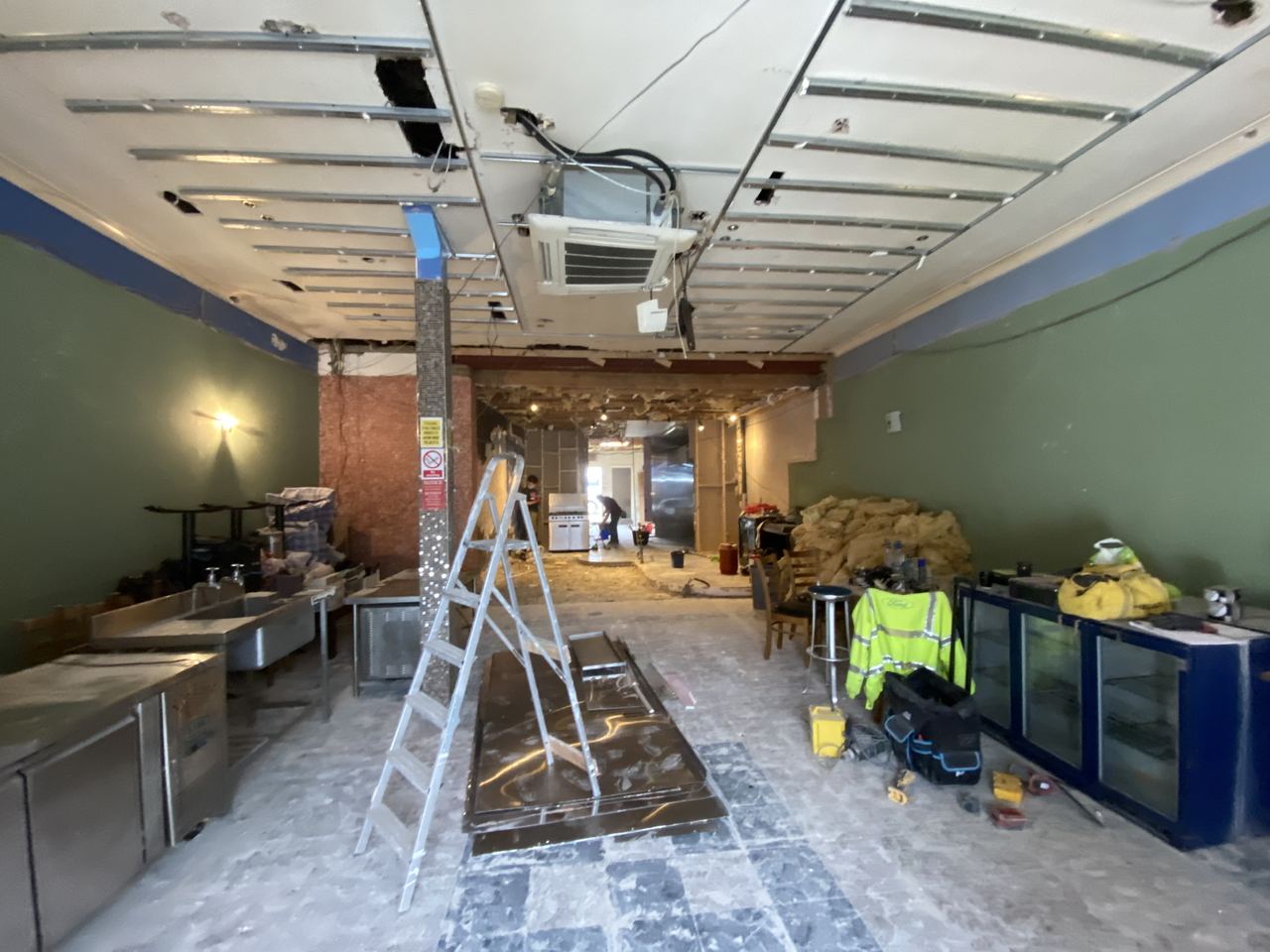 First-fix services and kitchen units going in before any finishes.